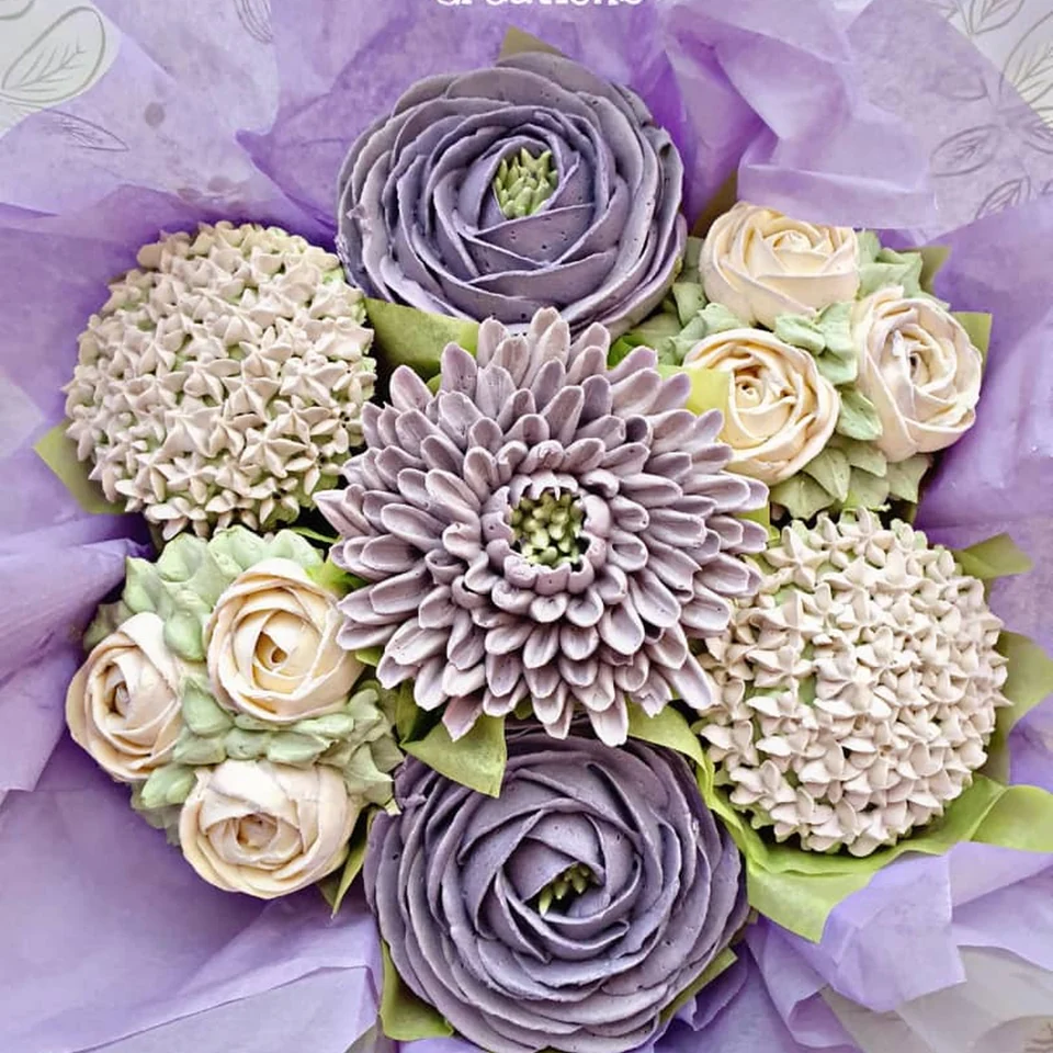 Purple and white assorted mixed blooms cupcake bouquet by Amour Desserts with pandan cupcake flavour